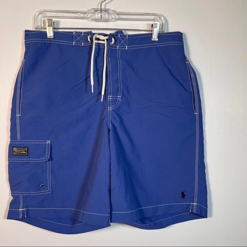 POLO RALPH LAUREN Swimwear. Blue w/cargo pocket, side pockets & key pocket. M